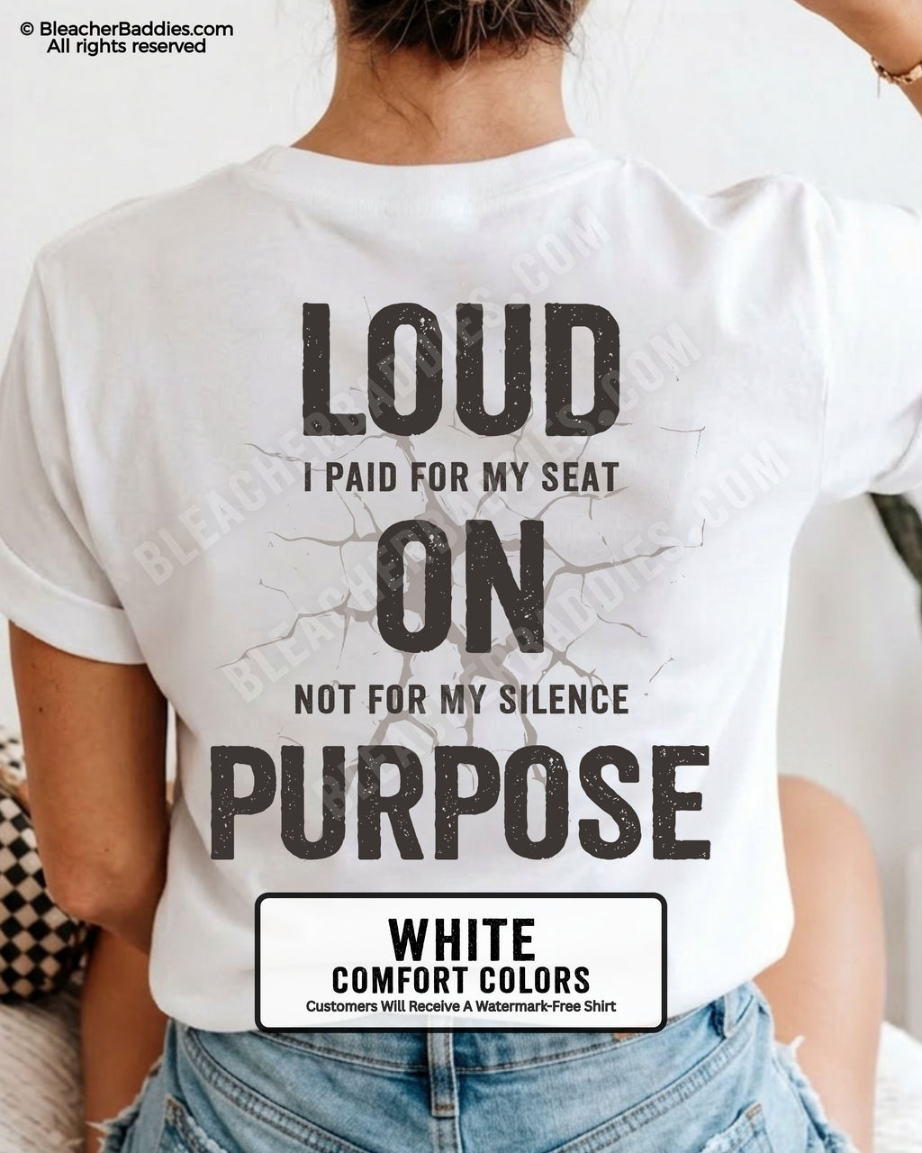 Woman wearing a WHITE Comfort Colors t-shirt shown from the back featuring a large distressed black graphic that reads “Loud I Paid for My Seat On Purpose Not For My Silence” with a cracked texture effect.