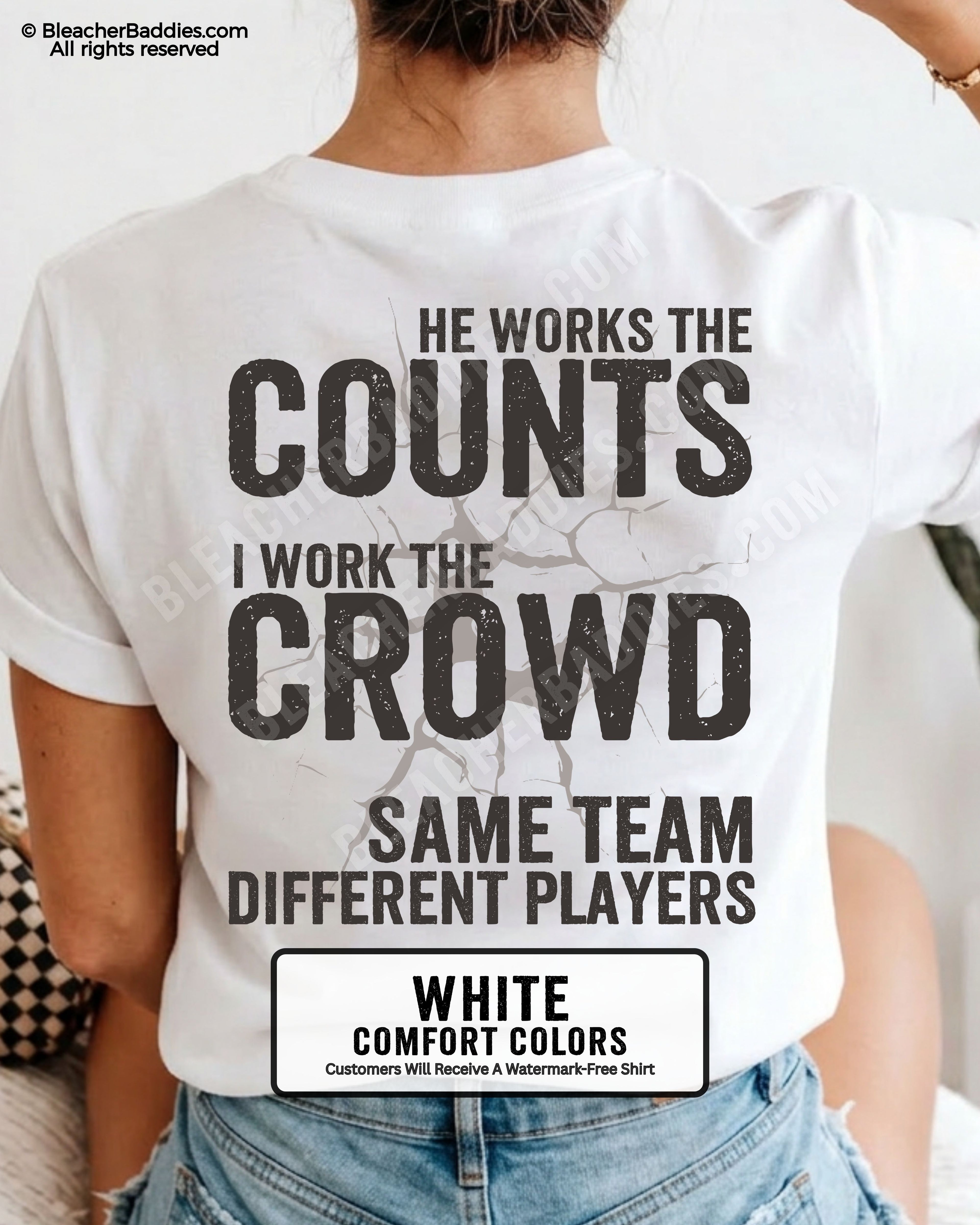 Whtie baseball mom graphic tee with distressed oversized lettering reading “He Works The Counts I Work The Crowd Same Team Different Players” across the back