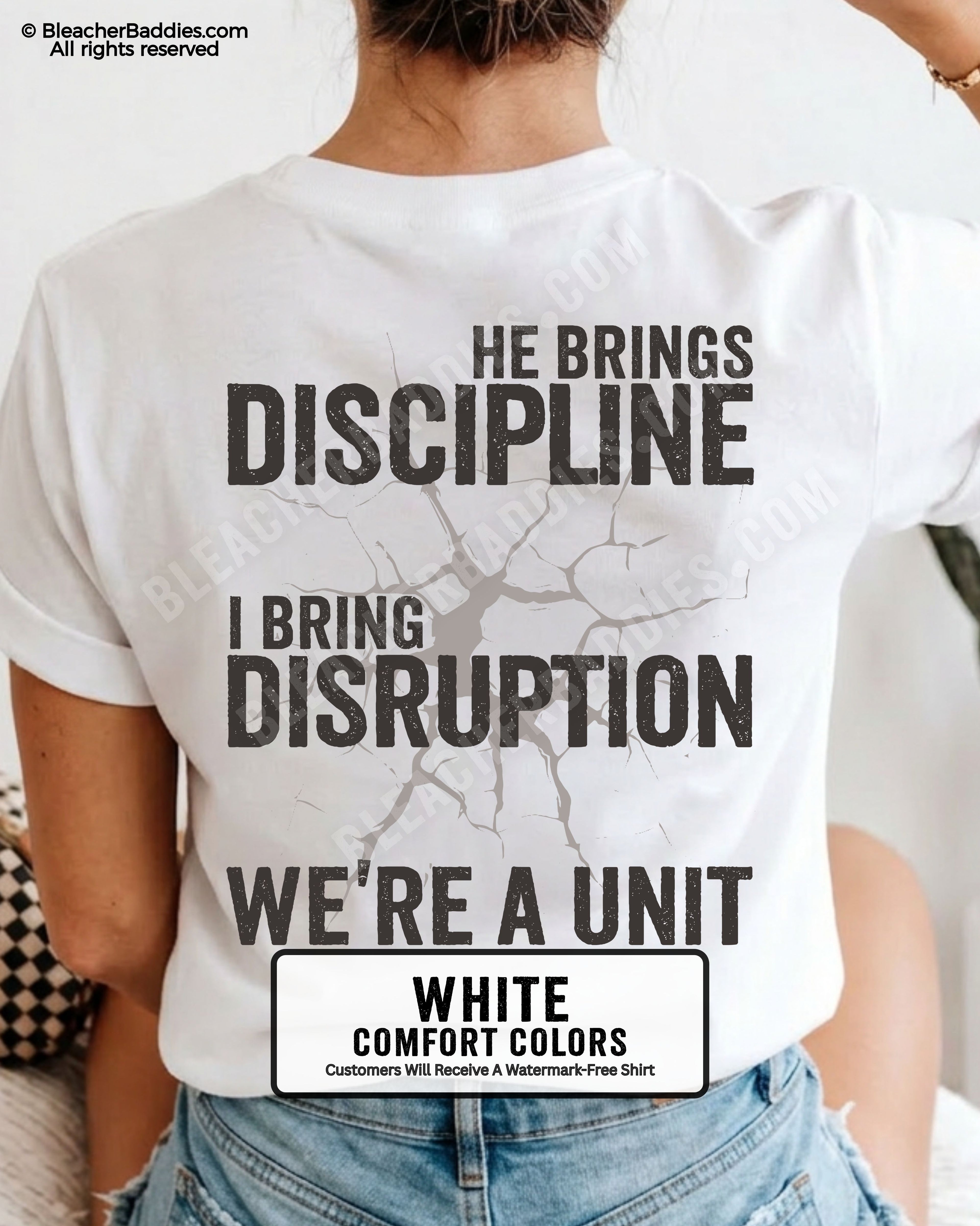 Back view of WHITE Comfort Colors football mom game day shirt featuring “He Brings Discipline I Bring Disruption We’re a Unit” design worn by woman indoors with denim shorts