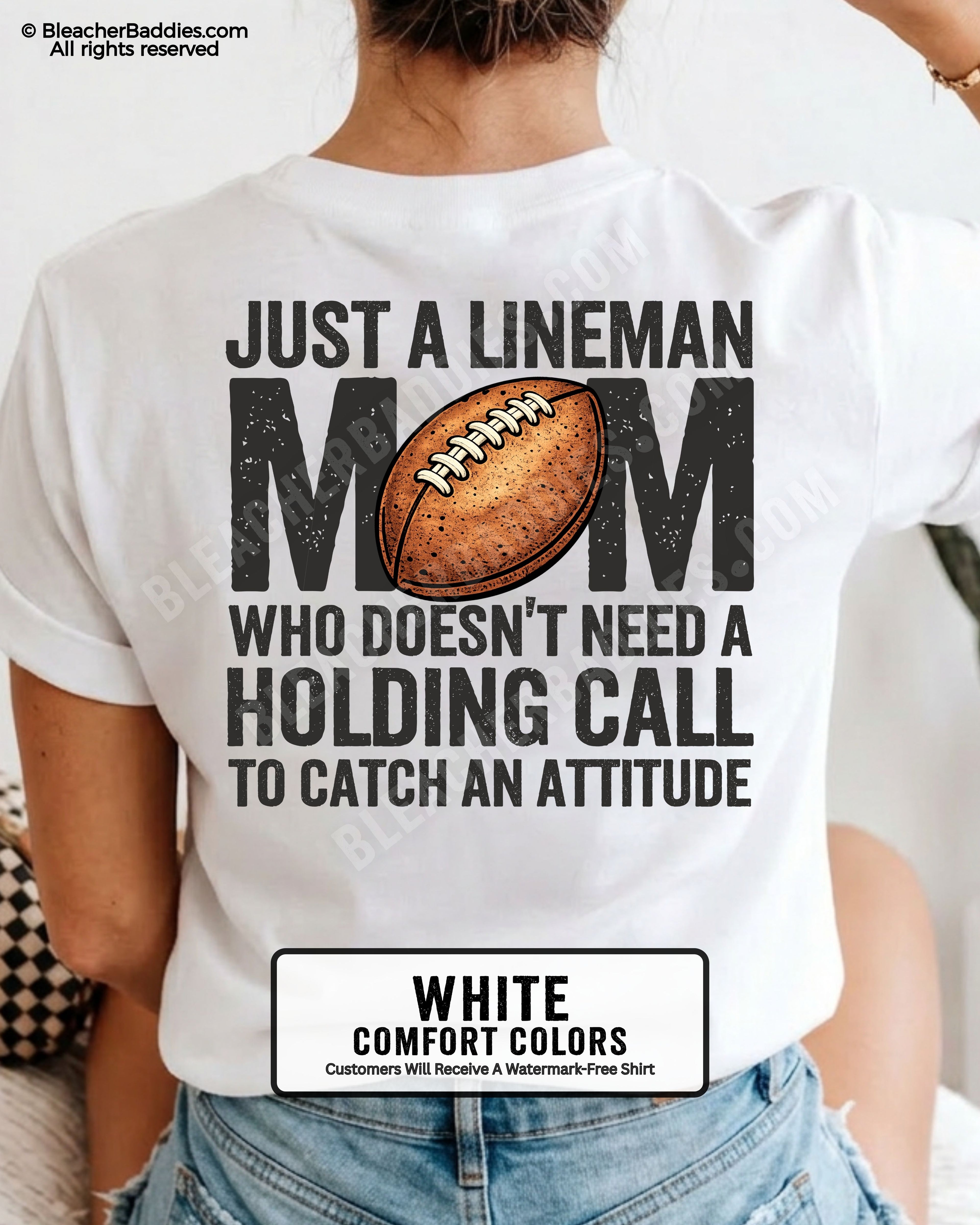 back view of woman wearing a white Comfort Colors lineman mom football shirt featuring bold back design that says “Just a lineman mom who doesn’t need a holding call to catch an attitude”