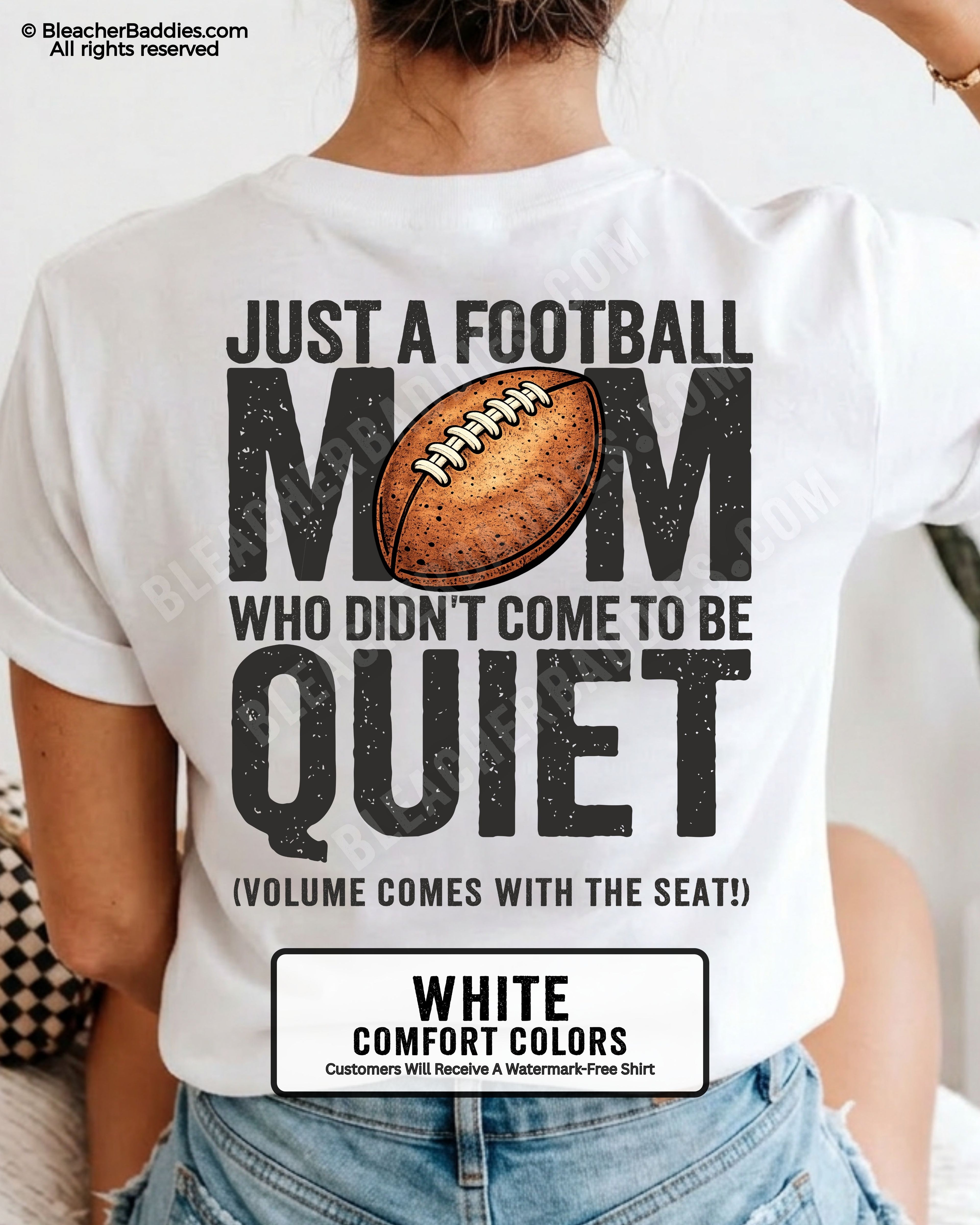 Football mom game day shirt on white Comfort Colors tee featuring bold back graphic that reads “Just a football mom who didn’t come to be quiet volume comes with the seat”