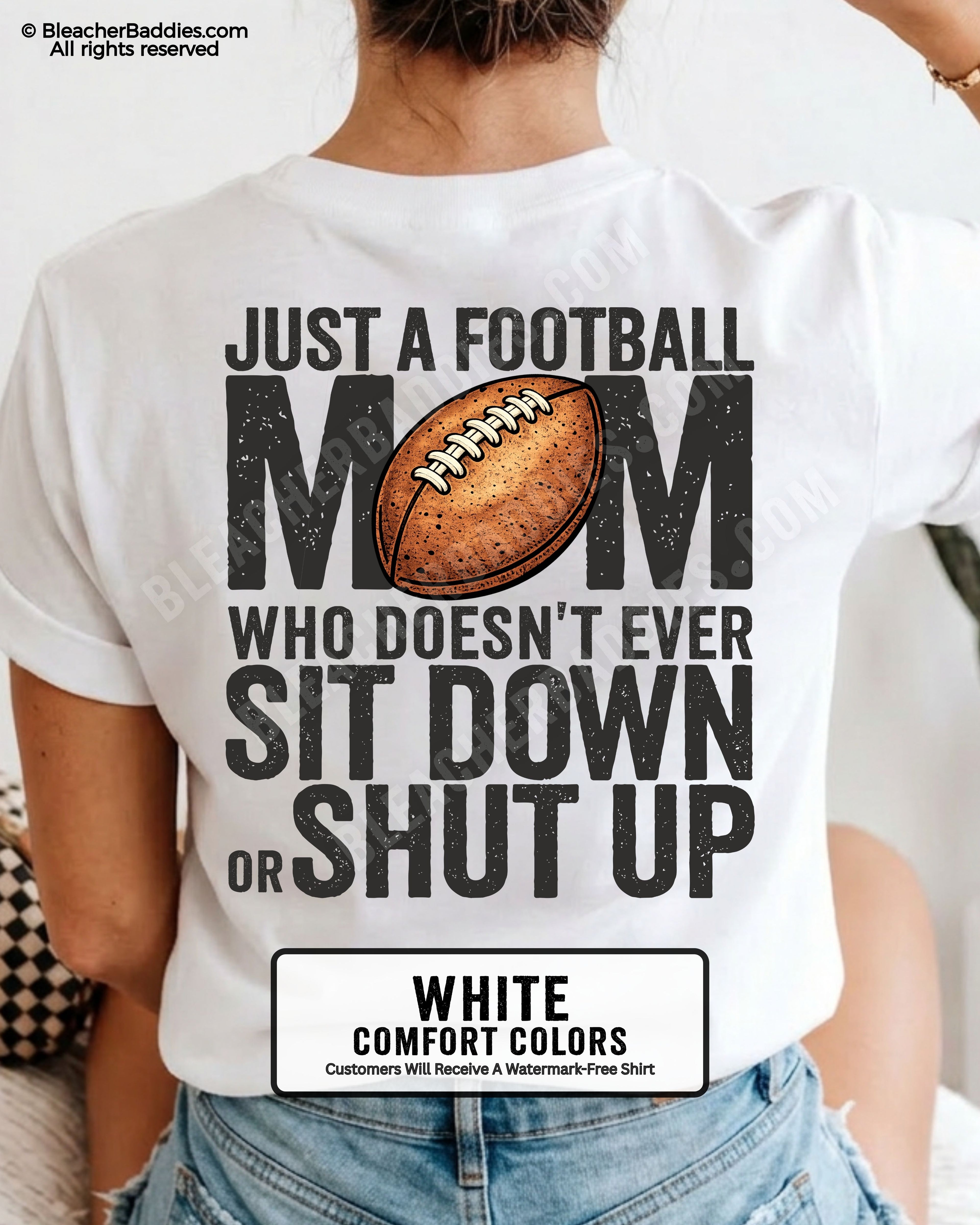 White Comfort Colors t-shirt shown from back with oversized graphic text “Just a Football Mom Who Doesn’t Ever Sit Down or Shut Up” and football illustration