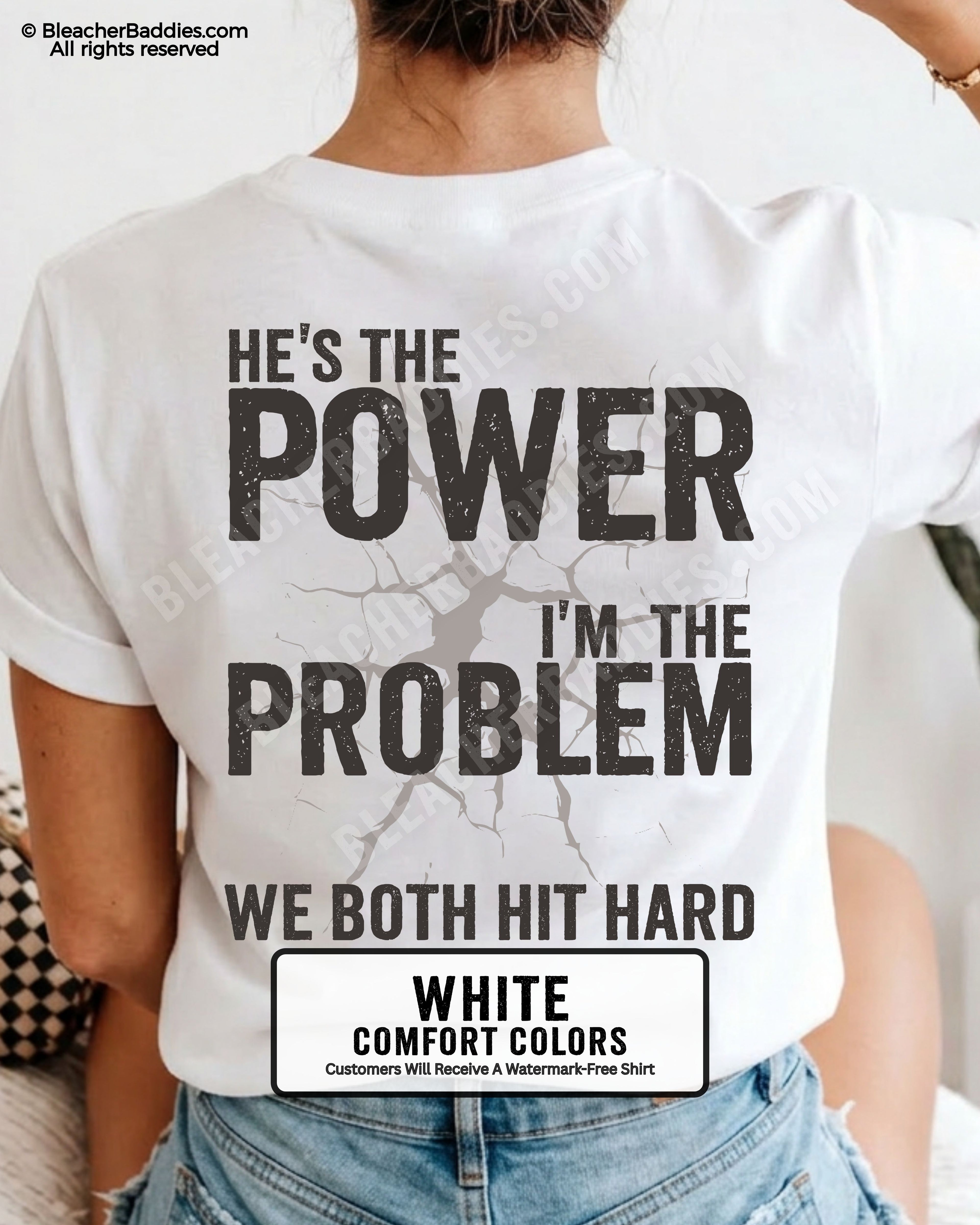 Back view of a white Comfort Colors football mom game day shirt reading “He’s the Power I’m the Problem We Both Hit Hard,” close-up fit on woman wearing denim shorts