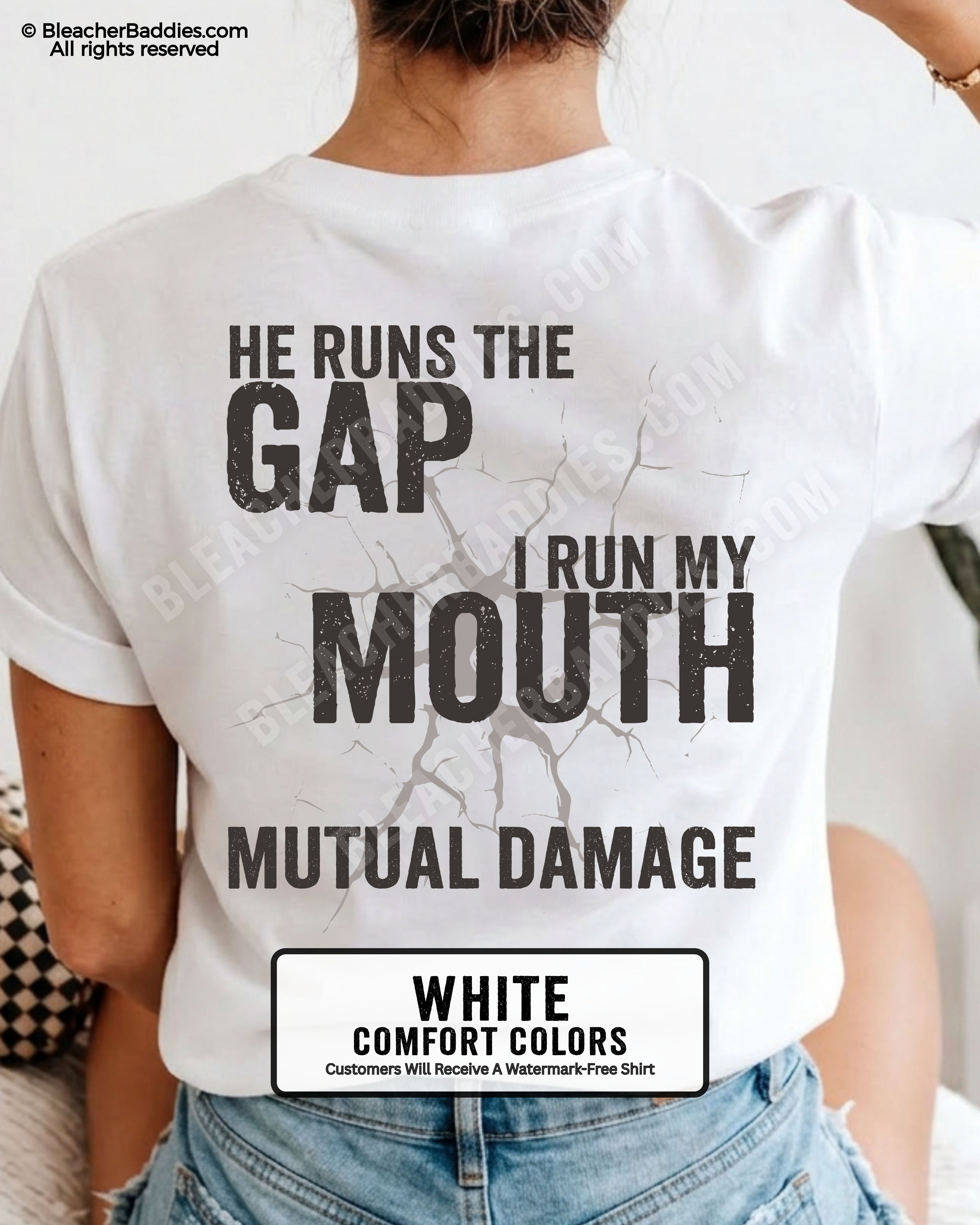 Back view of football mom wearing white Comfort Colors game day shirt with “He Runs the Gap I Run My Mouth Mutual Damage” graphic design