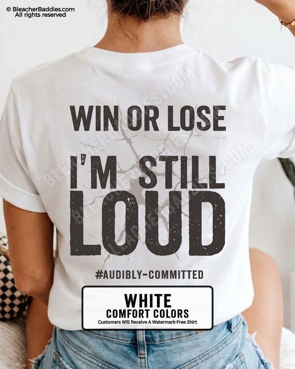 Woman wearing a white Comfort Colors t-shirt shown from the back featuring a large distressed black graphic that reads “Win or Lose I’m Still Loud #Audibly Committed.”