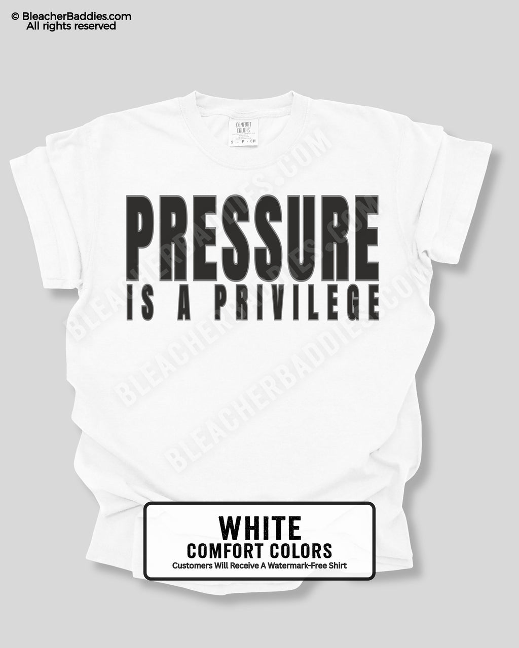 White t-shirt with 'PRESSURE IS A PRIVILEGE' text on a gray background