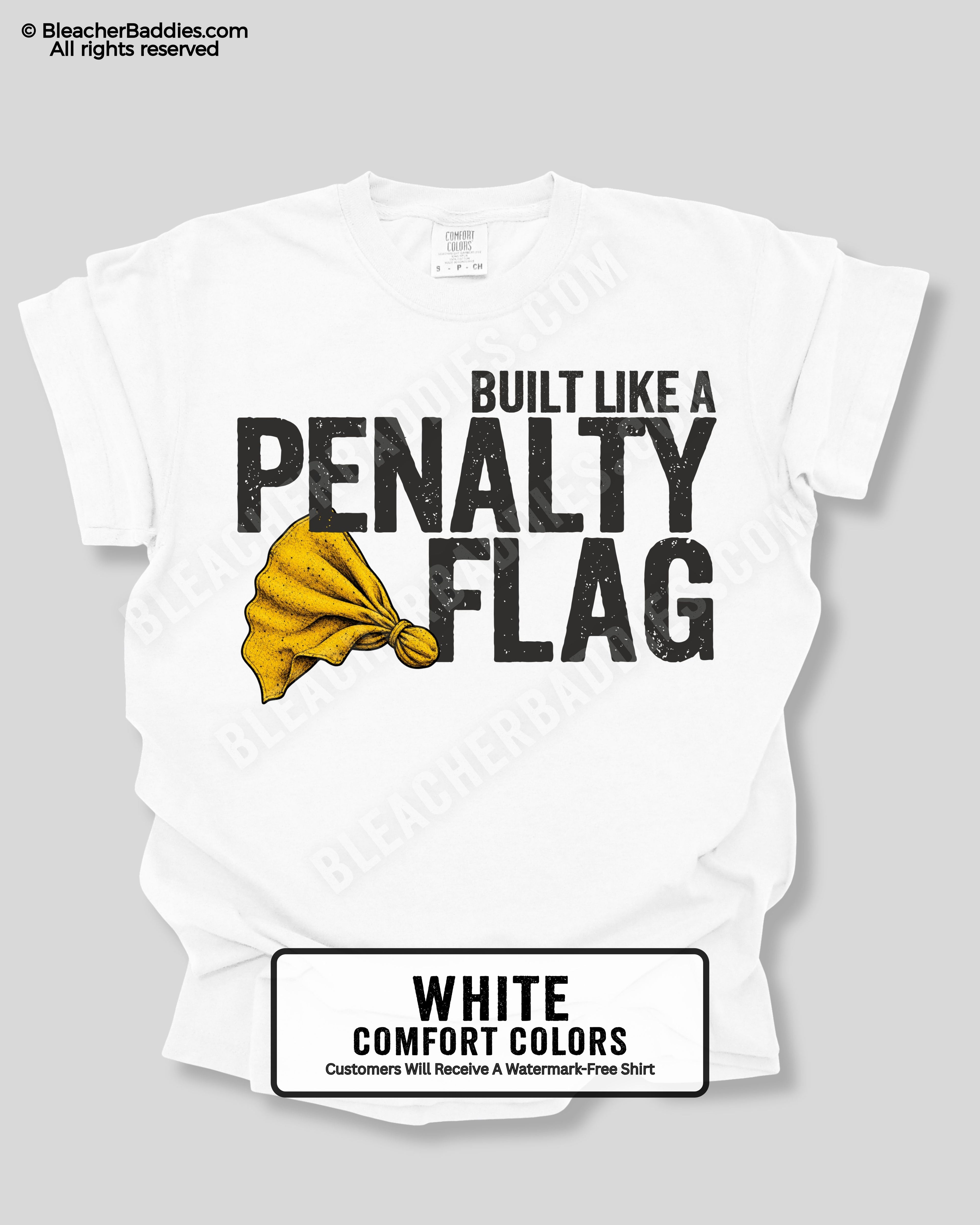 White t-shirt with 'Built Like a Penalty Flag' text and yellow graphic on a gray background