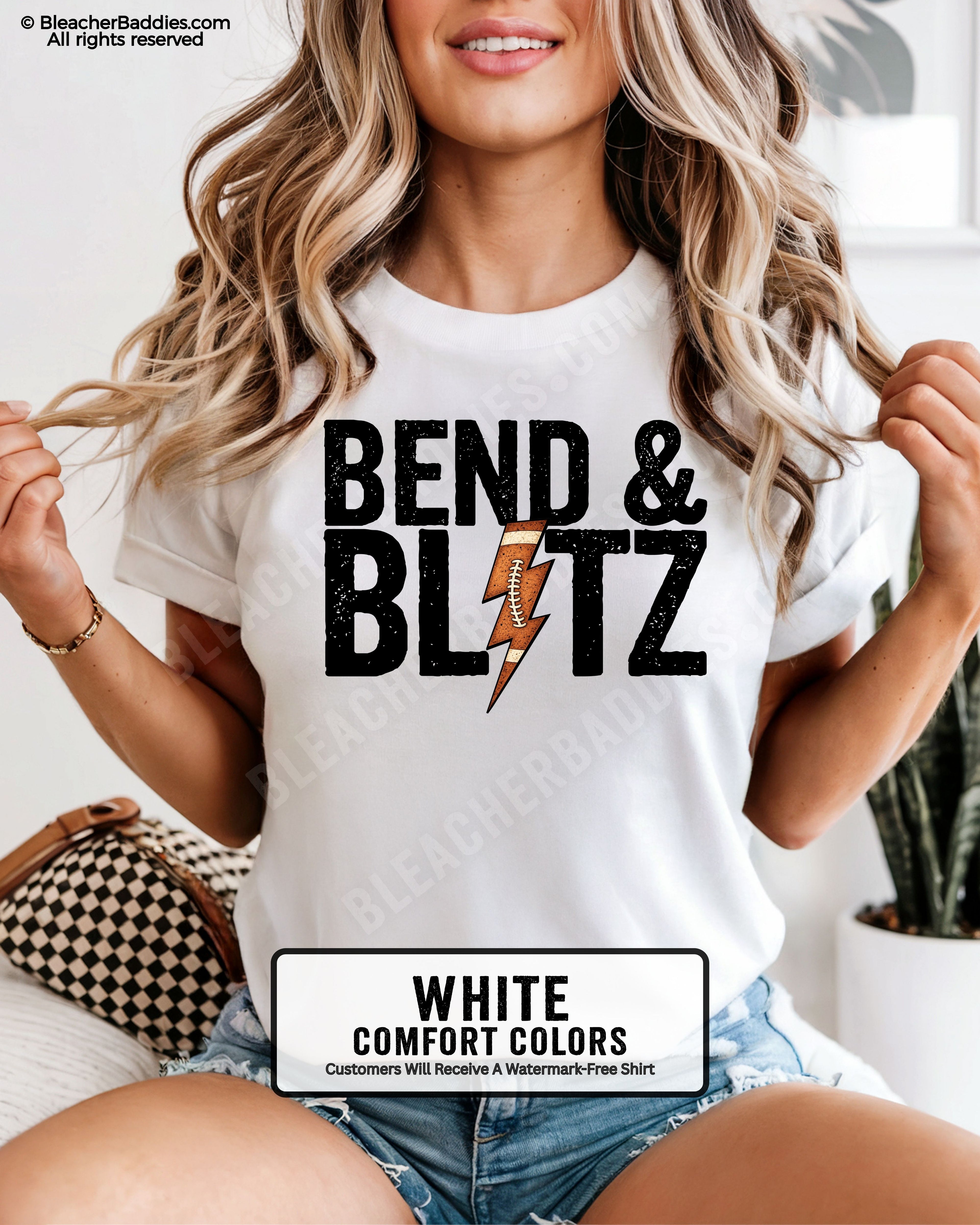 Front view of a white Comfort Colors t-shirt featuring the phrase "Bend & Blitz" in bold distressed lettering with a textured football lightning bolt graphic replacing the letter "I" for a trendy football game day design.
