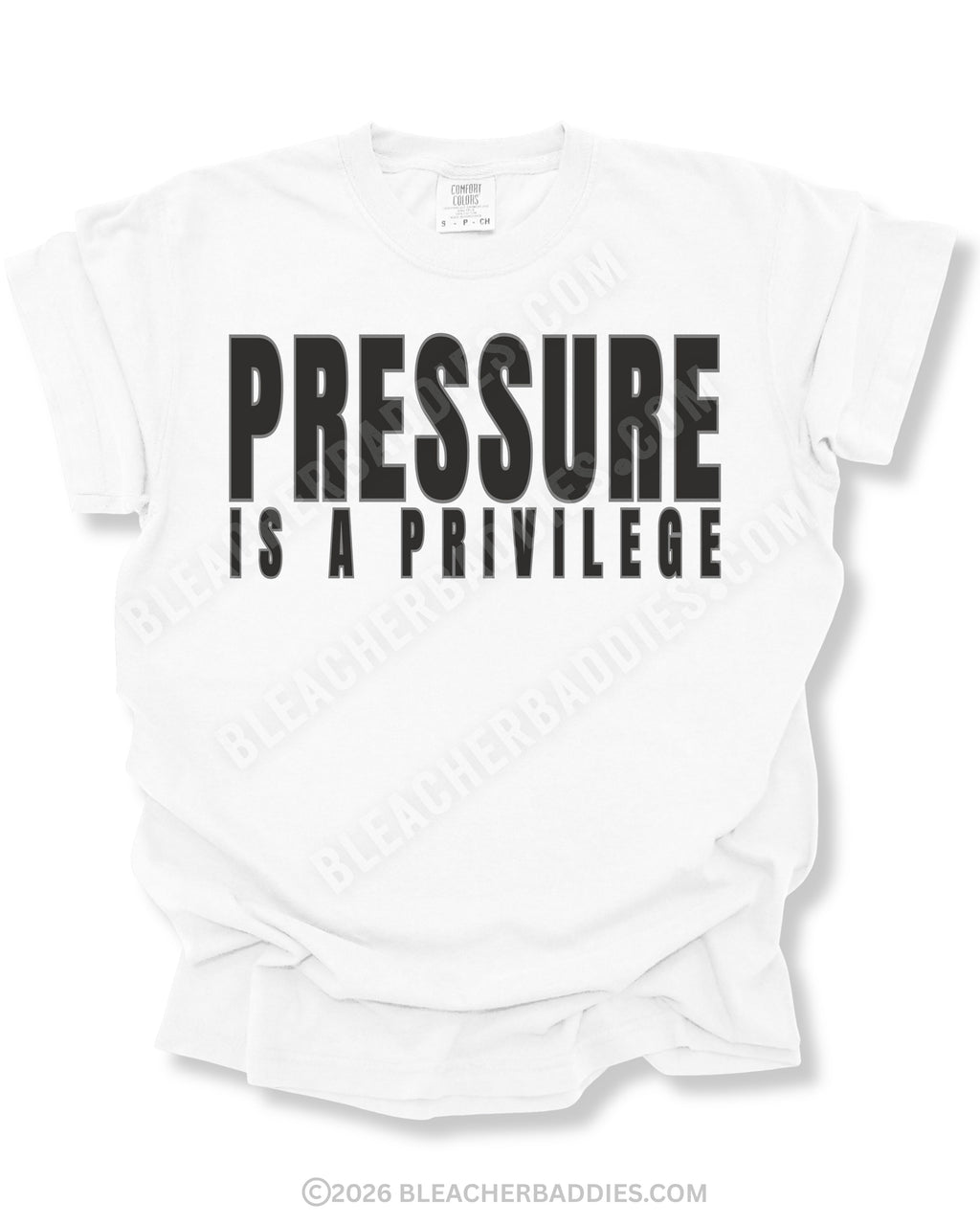White graphic t-shirt with bold distressed “PRESSURE IS A PRIVILEGE” text centered on the front of a relaxed fit short sleeve shirt displayed on a neutral background.
