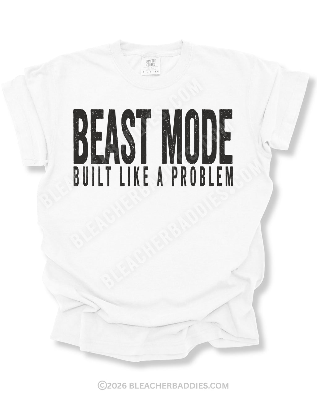 White Comfort Colors football game day shirt with distressed black “BEAST MODE BUILT LIKE A PROBLEM” graphic displayed on a flat lay mockup against a light background.
