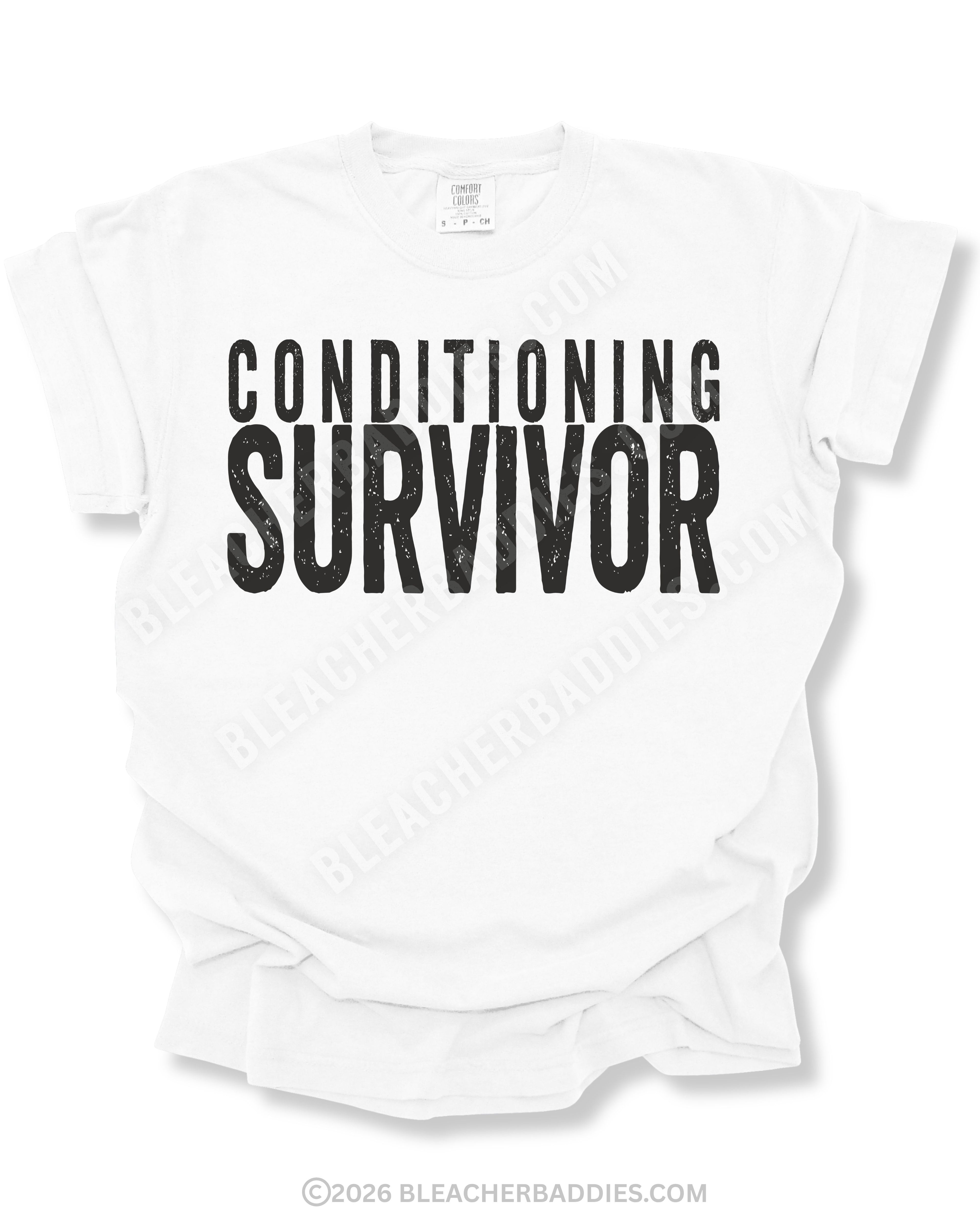 Flat lay mockup of a white Comfort Colors football game day shirt featuring distressed black text that reads “Conditioning Survivor” on a neutral gray background with BleacherBaddies.com watermark across the design.
