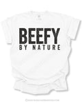 Flat lay mockup of a white Comfort Colors football shirt featuring distressed black text that reads “Beefy By Nature” on a white background.
