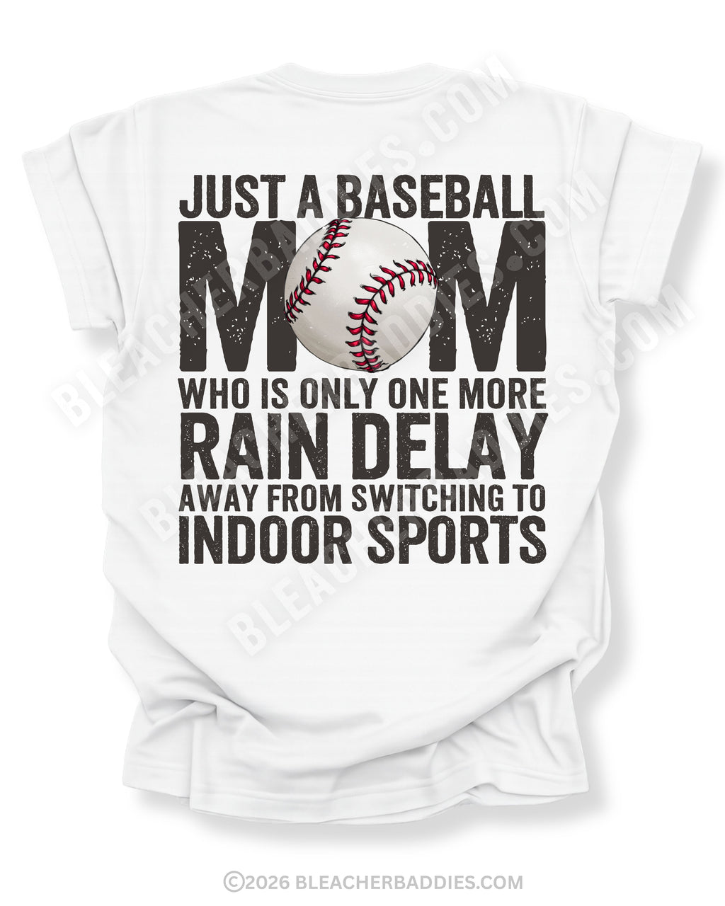 White Comfort Colors game day shirt with distressed back graphic reading “Just a Baseball Mom Who Is Only One More Rain Delay Away From Switching To Indoor Sports” with baseball graphic layered over MOM text