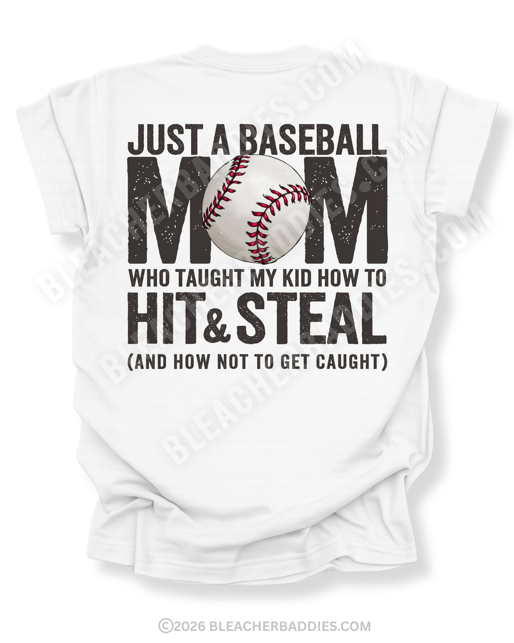 White Comfort Colors game day shirt with distressed back graphic reading “Just a Baseball Mom Who Taught My Kid How to Hit & Steal (And How Not to Get Caught)” with baseball graphic layered over MOM text