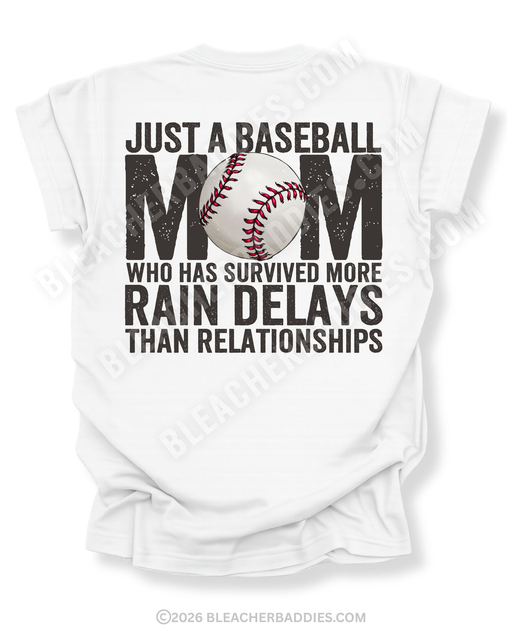 White Comfort Colors game day shirt with distressed back graphic reading “Just a Baseball Mom Who Has Survived More Rain Delays Than Relationships” with baseball graphic layered over MOM text