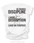 White Comfort Colors shirt featuring distressed “He Brings Discipline I Bring Disruption” back graphic with bold vintage-style typography and “Loud On Purpose” slogan.