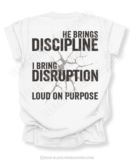 White Comfort Colors shirt featuring distressed “He Brings Discipline I Bring Disruption” back graphic with bold vintage-style typography and “Loud On Purpose” slogan.