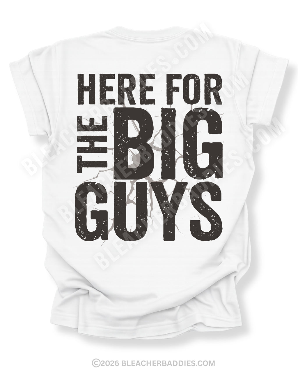 White football mom game day shirt with bold distressed black text reading “Here for the big guys” with cracked graphic behind the lettering