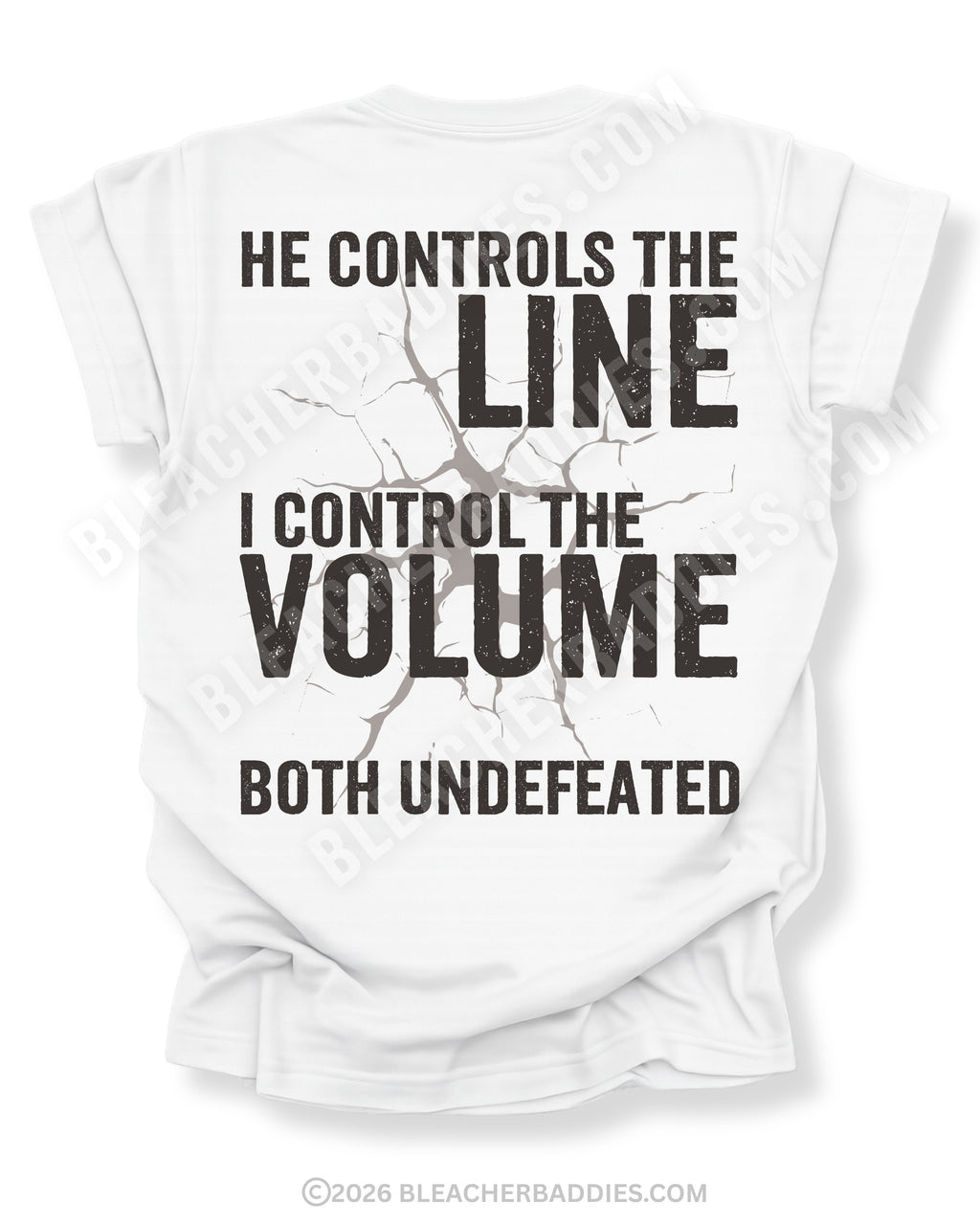 Back view of white Comfort Colors football mom game day shirt featuring “He Controls the Line I Control the Volume Both Undefeated” bold graphic design