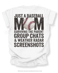 White Comfort Colors game day shirt with distressed back graphic reading “Just a Baseball Mom Surviving the Parent Group Chats & Weather Radar Screenshots” with baseball graphic layered over MOM text