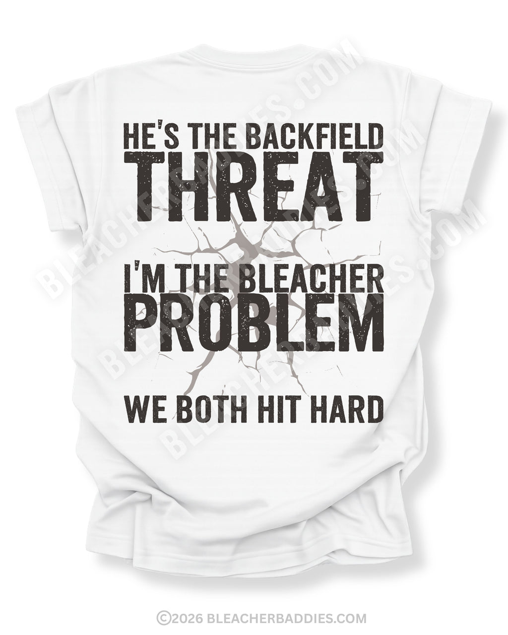 Back view of white Comfort Colors football mom game day shirt featuring “He’s the Backfield Threat I’m the Bleacher Problem We Both Hit Hard” bold graphic design