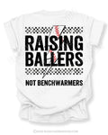 White Comfort Colors baseball mom shirt with distressed Raising Ballers graphic featuring checkerboard details, red baseball stitching, and “Not Benchwarmers” slogan on back design.
