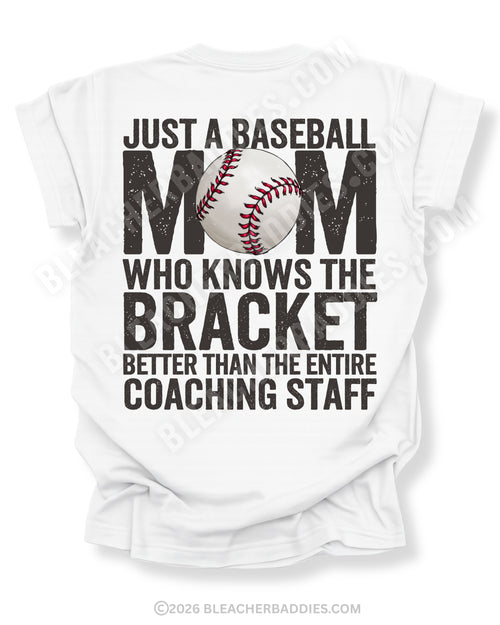 White baseball mom game day shirt with distressed black text reading “Just a baseball mom who knows the bracket better than the entire coaching staff” and baseball graphic replacing the O in MOM