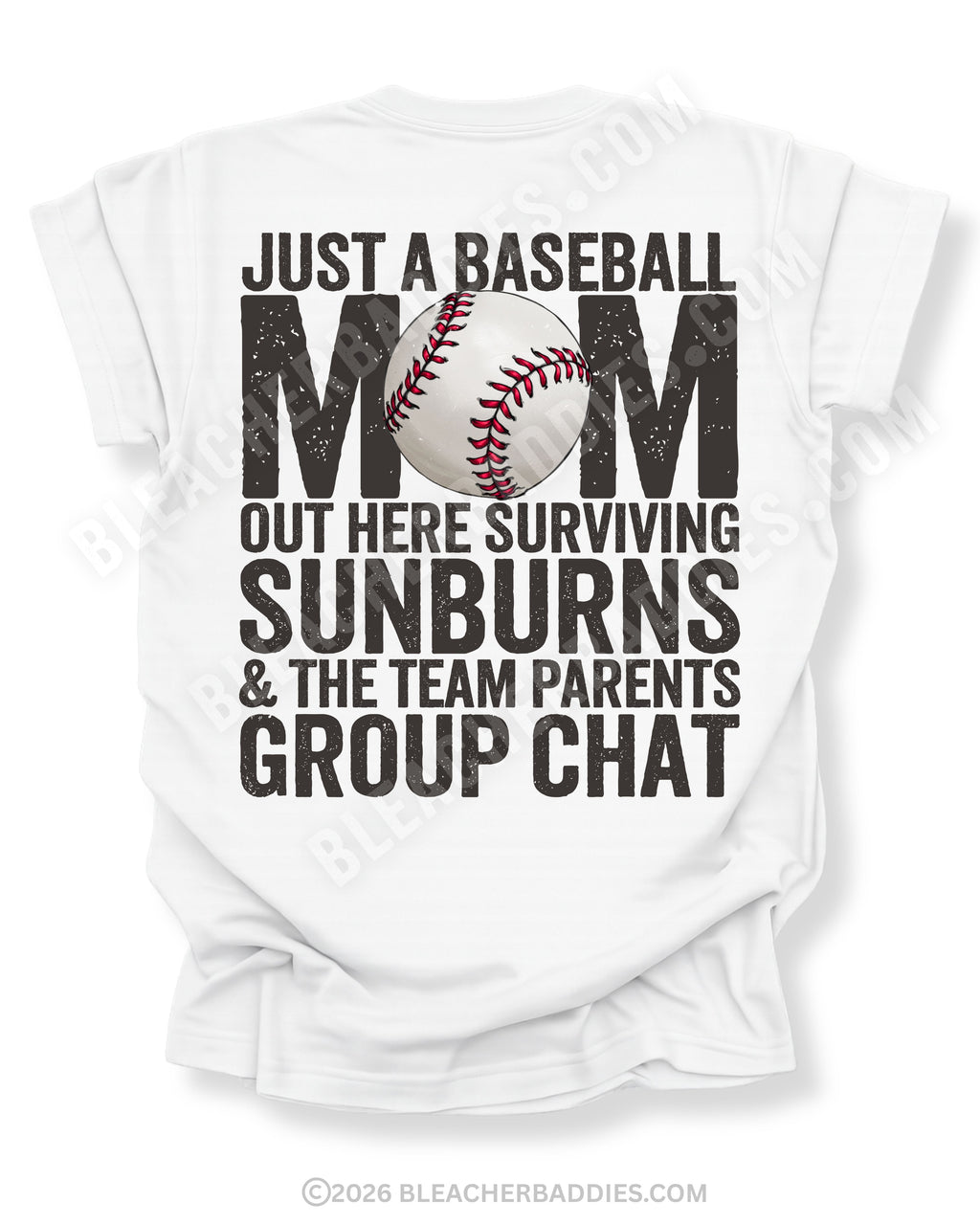 White Comfort Colors game day shirt with distressed back graphic reading “Just a Baseball Mom Out Here Surviving Sunburns & The Team Parents Group Chat” with baseball graphic layered over MOM text