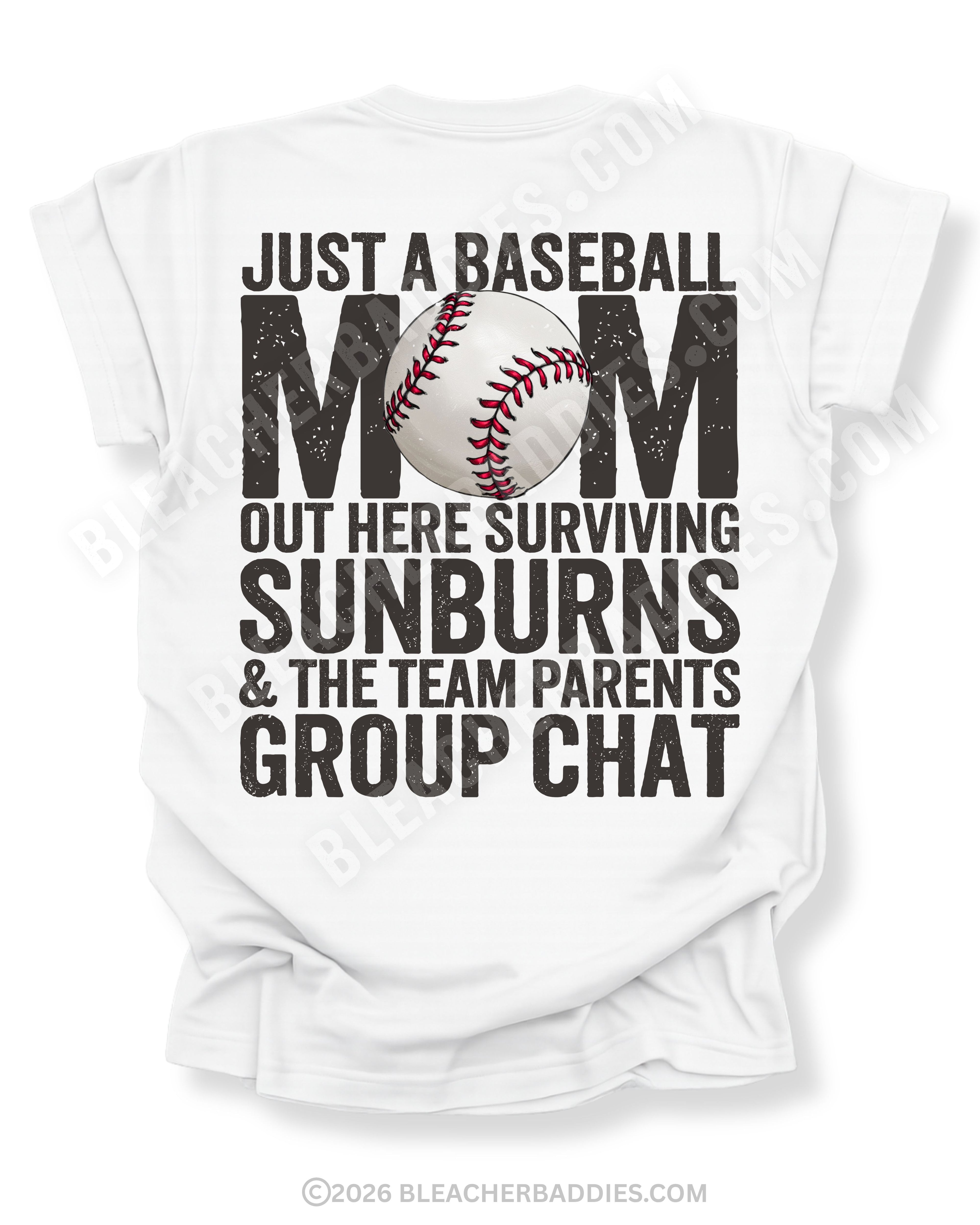 White Comfort Colors game day shirt with distressed back graphic reading “Just a Baseball Mom Out Here Surviving Sunburns & The Team Parents Group Chat” with baseball graphic layered over MOM text