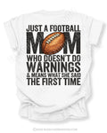 Football mom game day shirt flat lay mockup on white tee featuring bold back design that reads “Just a football mom who doesn’t do warnings & means what she said the first time”