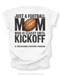 White Comfort Colors t-shirt with large back graphic reading “Just a Football Mom Who Is Classy Until Kickoff (& Then Becomes Everyone’s Problem)” with a football illustration