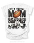 White Comfort Colors t-shirt with back graphic reading “Just a football mom bringing blind confidence & unsolicited commentary” with football illustration