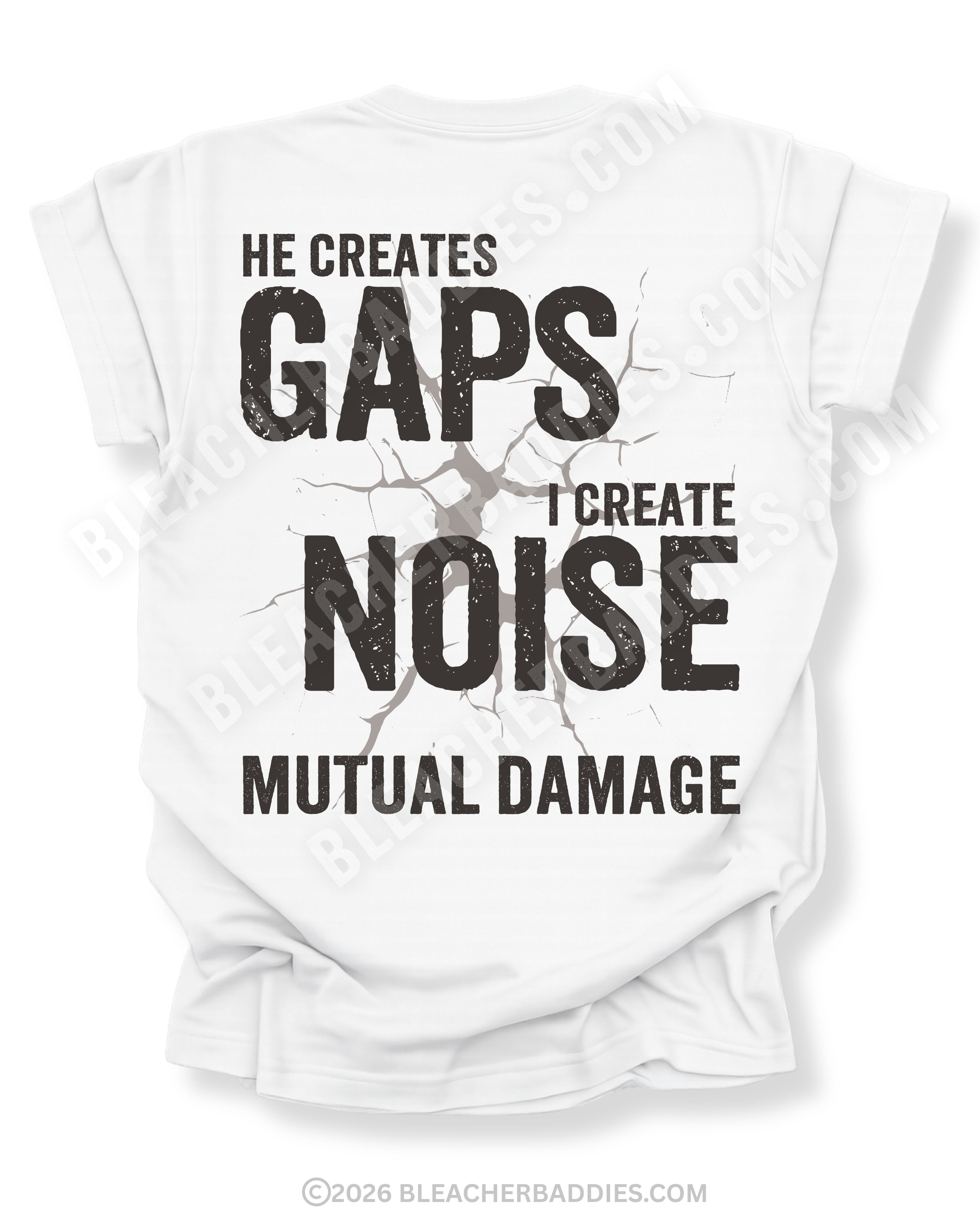 White Comfort Colors football mom game day shirt flat lay with back design that reads “He creates gaps I create noise mutual damage” in distressed black text with cracked impact graphic