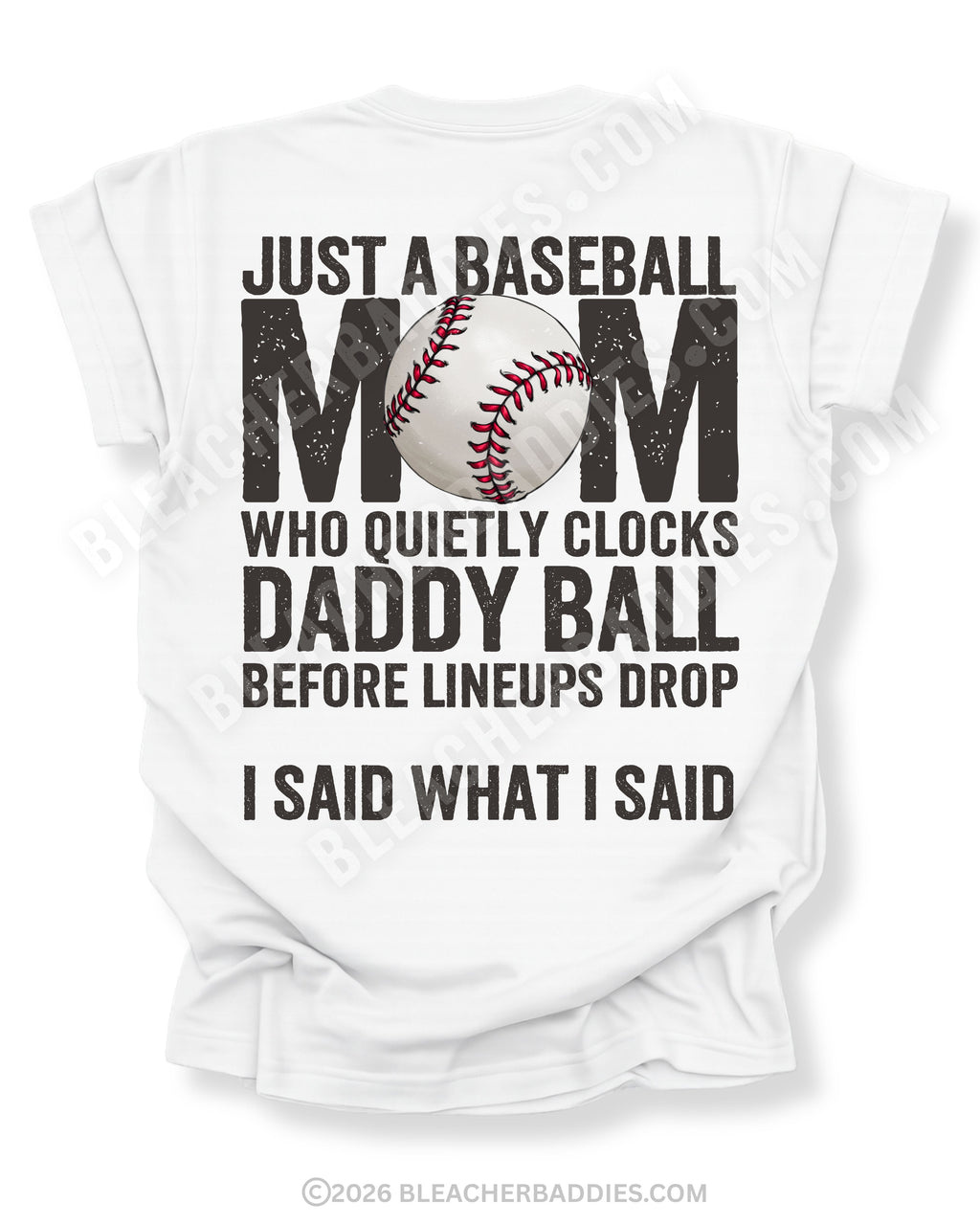 White Comfort Colors game day shirt with distressed back graphic reading “Just a Baseball Mom Who Quietly Clocks Daddy Ball Before Lineups Drop I Said What I Said” with baseball graphic layered over MOM text