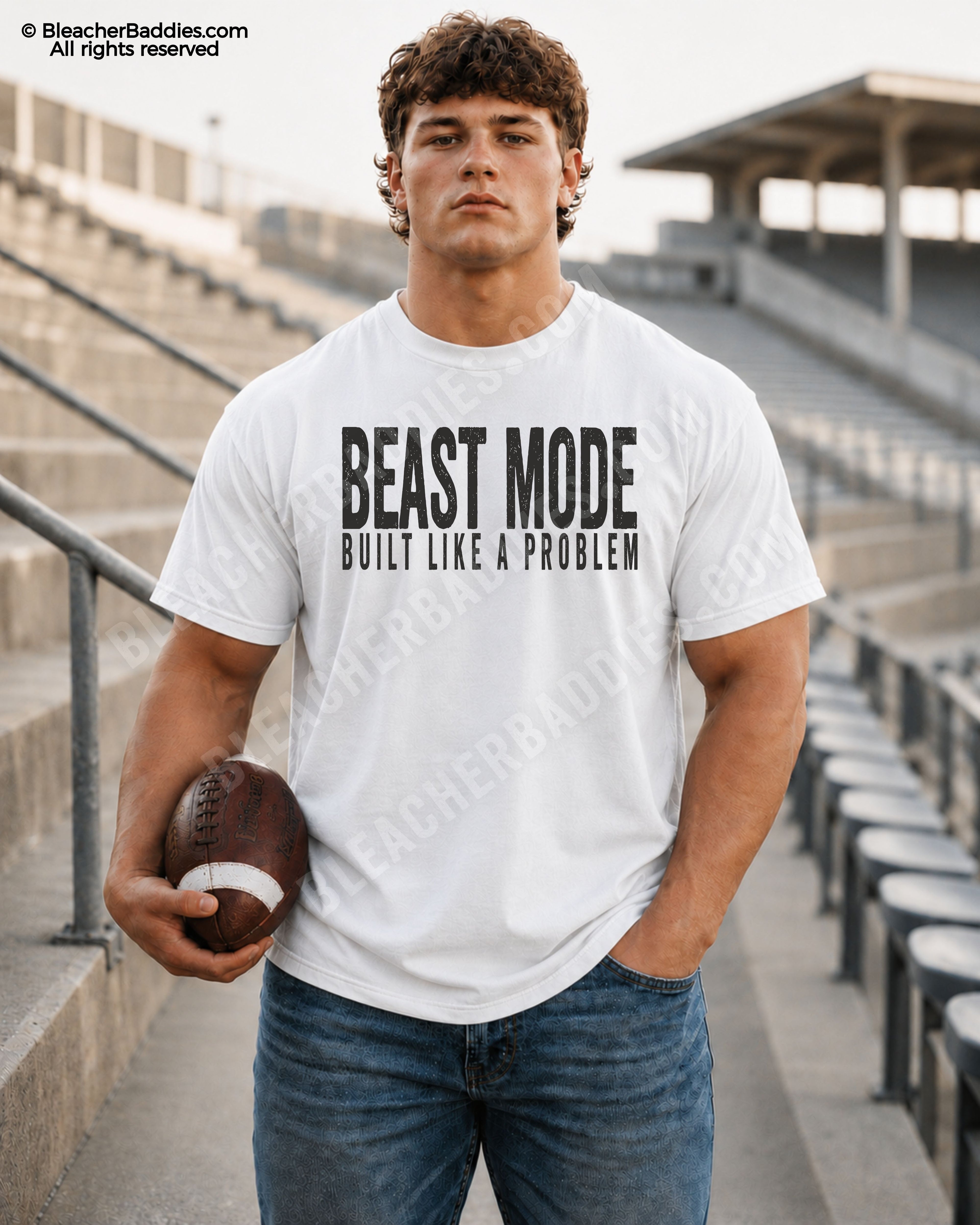 Football player model standing in stadium bleachers wearing a white oversized game day shirt featuring distressed “BEAST MODE BUILT LIKE A PROBLEM” typography with football in hand.